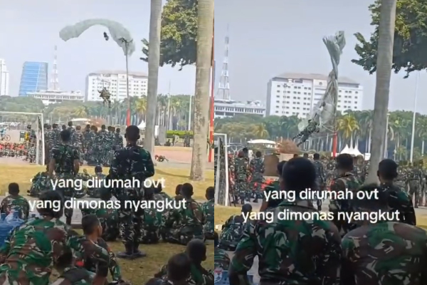 Penerjun Payung Tersangkut di Tiang Lampu Monas Saat Mendarat, Diduga Karena Angin Kencang