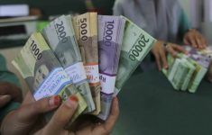 Hukum Tukar Uang Baru saat Lebaran, Apakah Termasuk Riba