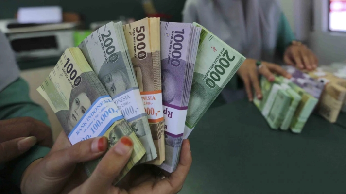 Hukum Tukar Uang Baru saat Lebaran, Apakah Termasuk Riba